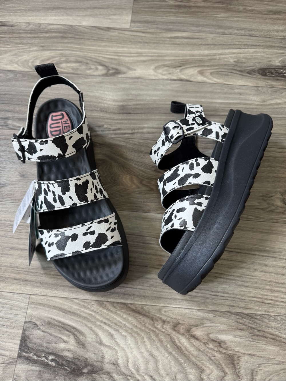 Hey Dude Delray Buckle Platform Sandal in Black/White Animal Cow Print Size 10